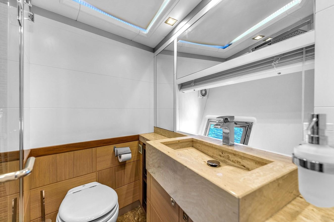 a bathroom with a sink and a toilet aboard GREYT ESCAPE Yacht for Sale