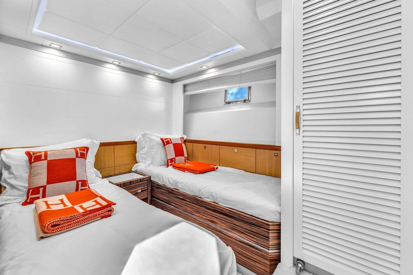 a room with two beds aboard GREYT ESCAPE Yacht for Sale
