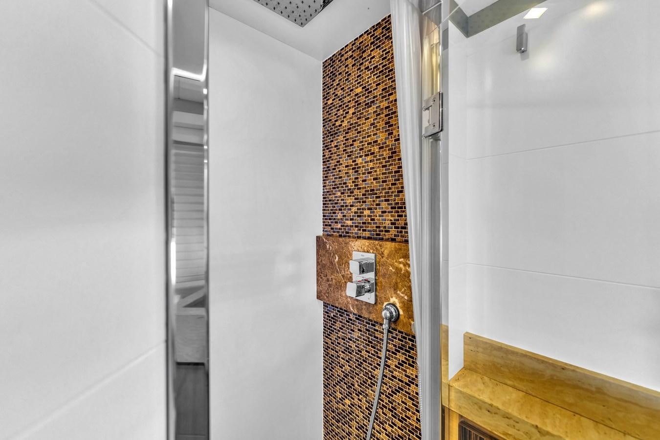 a wall with a door and a heater aboard GREYT ESCAPE Yacht for Sale