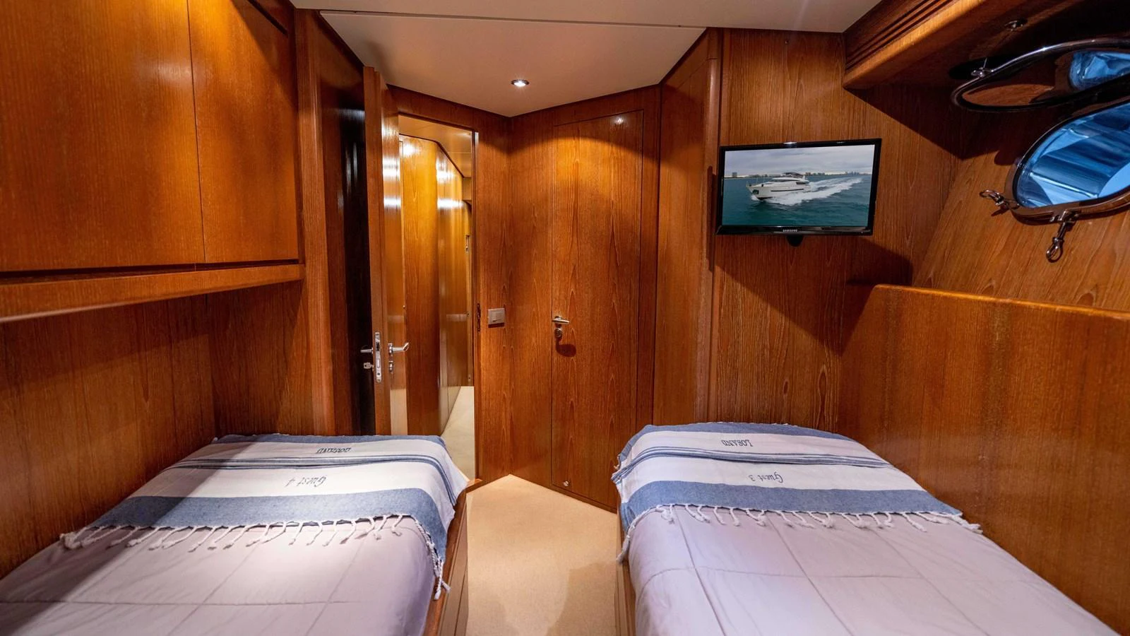 a room with two beds aboard LOSAND Yacht for Sale