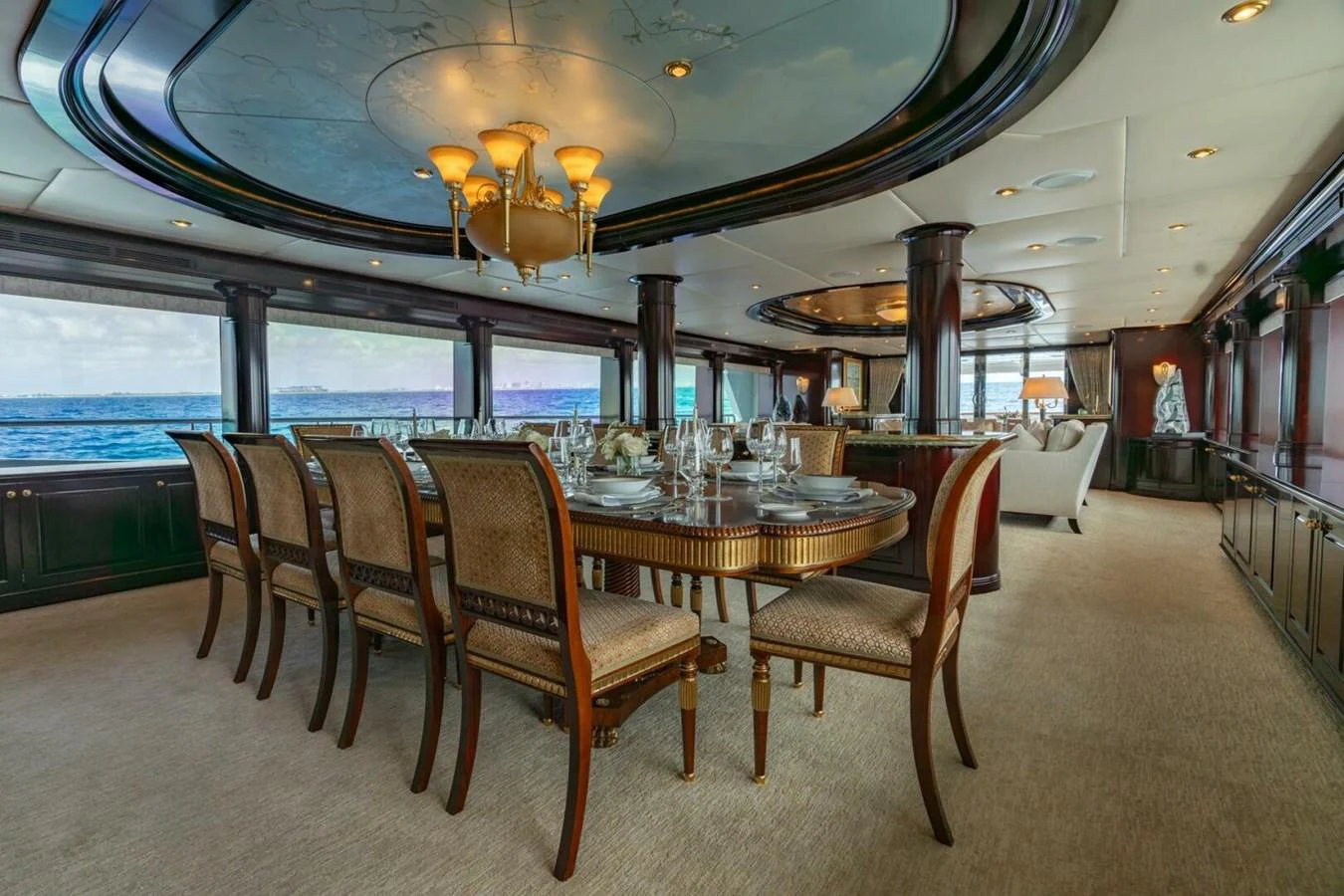 a dining room with a table and chairs aboard MISS CHRISTINE Yacht for Sale