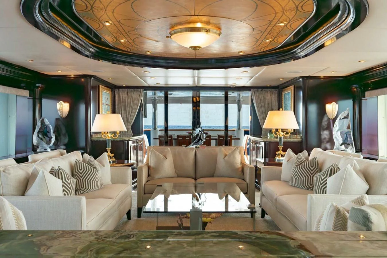 a living room with a large window aboard MISS CHRISTINE Yacht for Sale