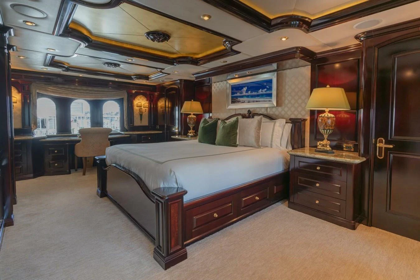 a large bed in a room aboard MISS CHRISTINE Yacht for Sale