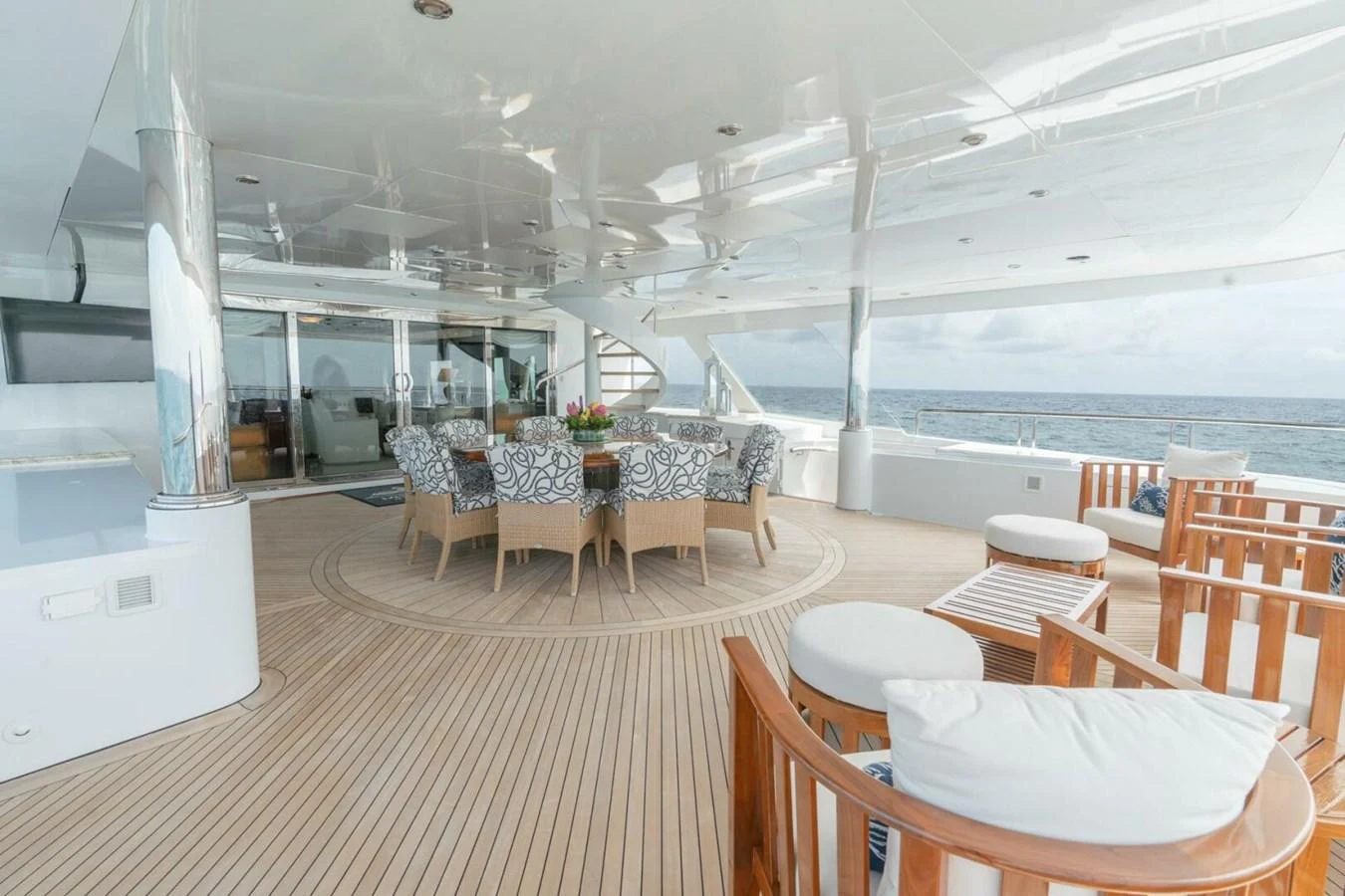 a room with tables and chairs aboard MISS CHRISTINE Yacht for Sale
