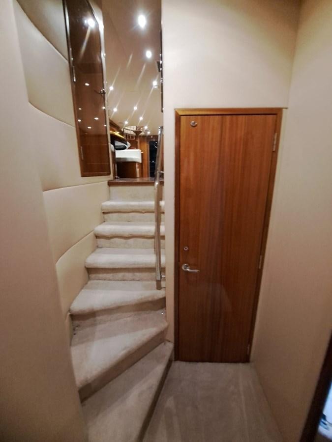 a staircase leading to a door aboard MARY ROSE Yacht for Sale