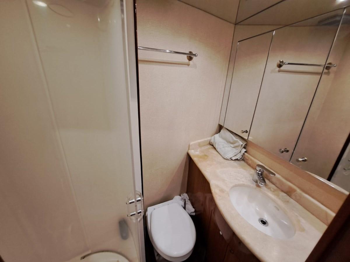 a bathroom with a sink and a toilet aboard MARY ROSE Yacht for Sale