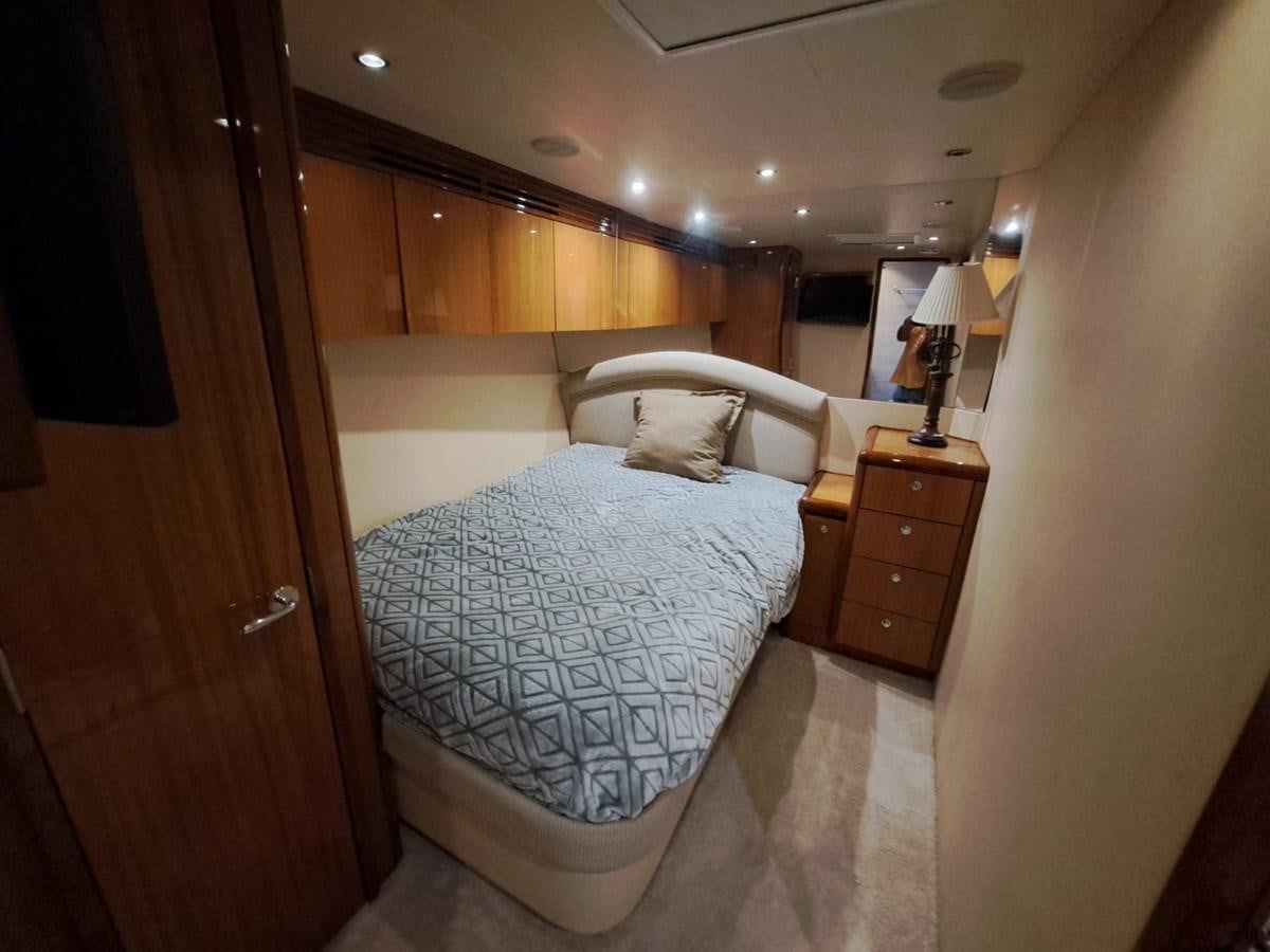 a bed in a room aboard MARY ROSE Yacht for Sale