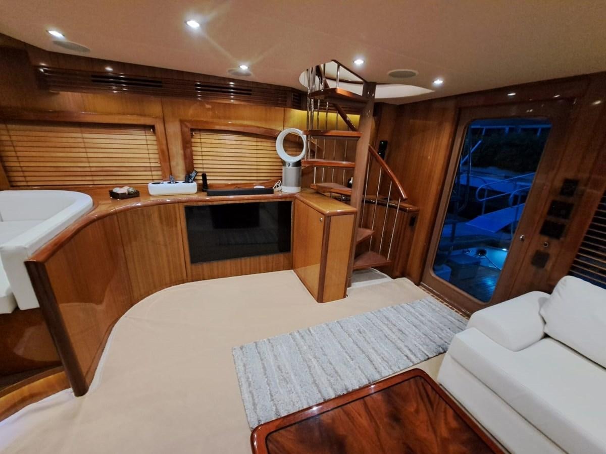 a room with a bed and a desk aboard MARY ROSE Yacht for Sale