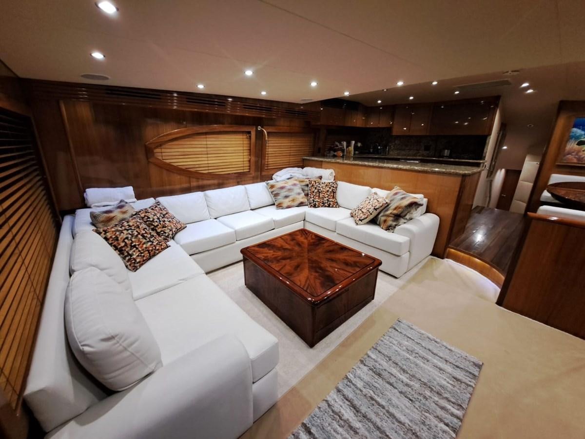a living room with a couch and a table aboard MARY ROSE Yacht for Sale