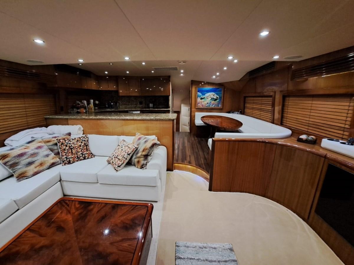 a living room with a couch and a table aboard MARY ROSE Yacht for Sale