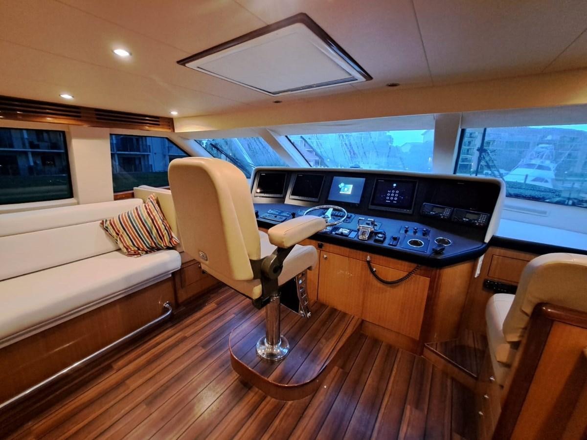 a room with a couch and a machine on the counter aboard MARY ROSE Yacht for Sale