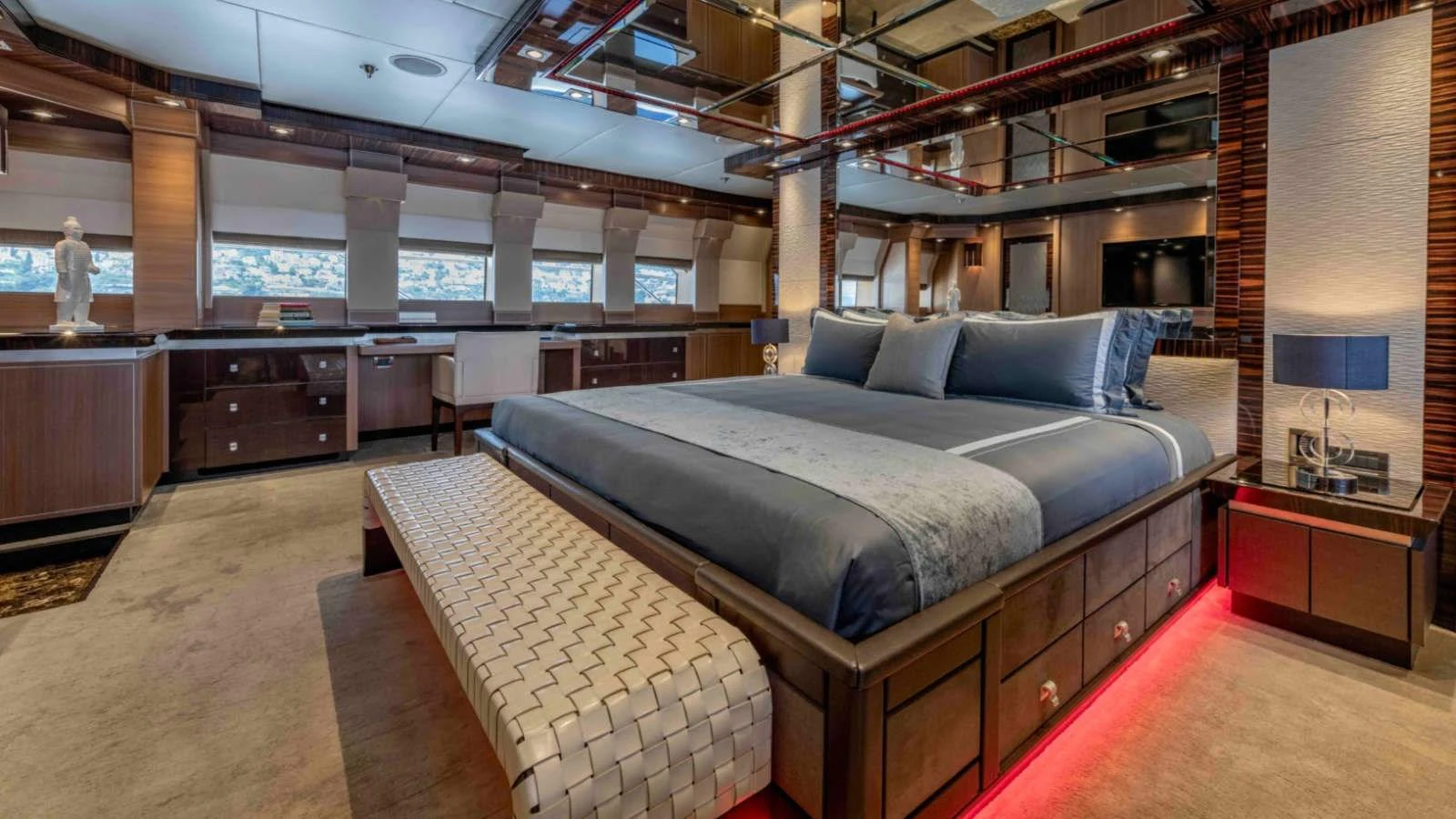 The master stateroom exudes luxury with its spacious layout and elegant furnishings. aboard PALMER JOHNSON 150 Yacht for Sale