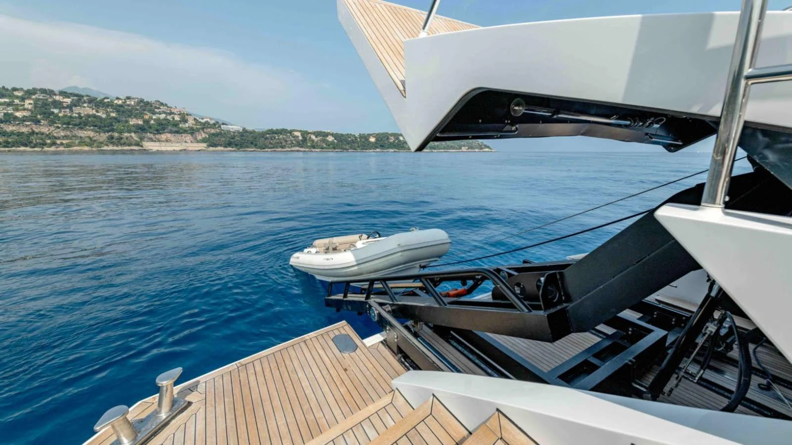 The yacht features a convenient tender launch system, perfect for easy access to the water. aboard PALMER JOHNSON 150 Yacht for Sale