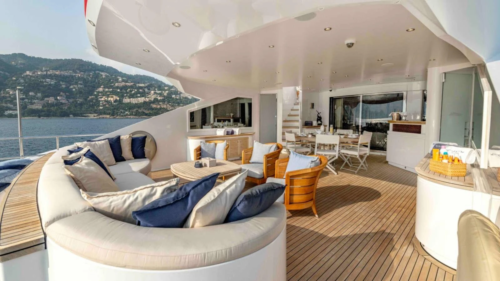 The spacious aft deck offers luxurious seating and dining areas with stunning views of the surrounding landscape. aboard PALMER JOHNSON 150 Yacht for Sale