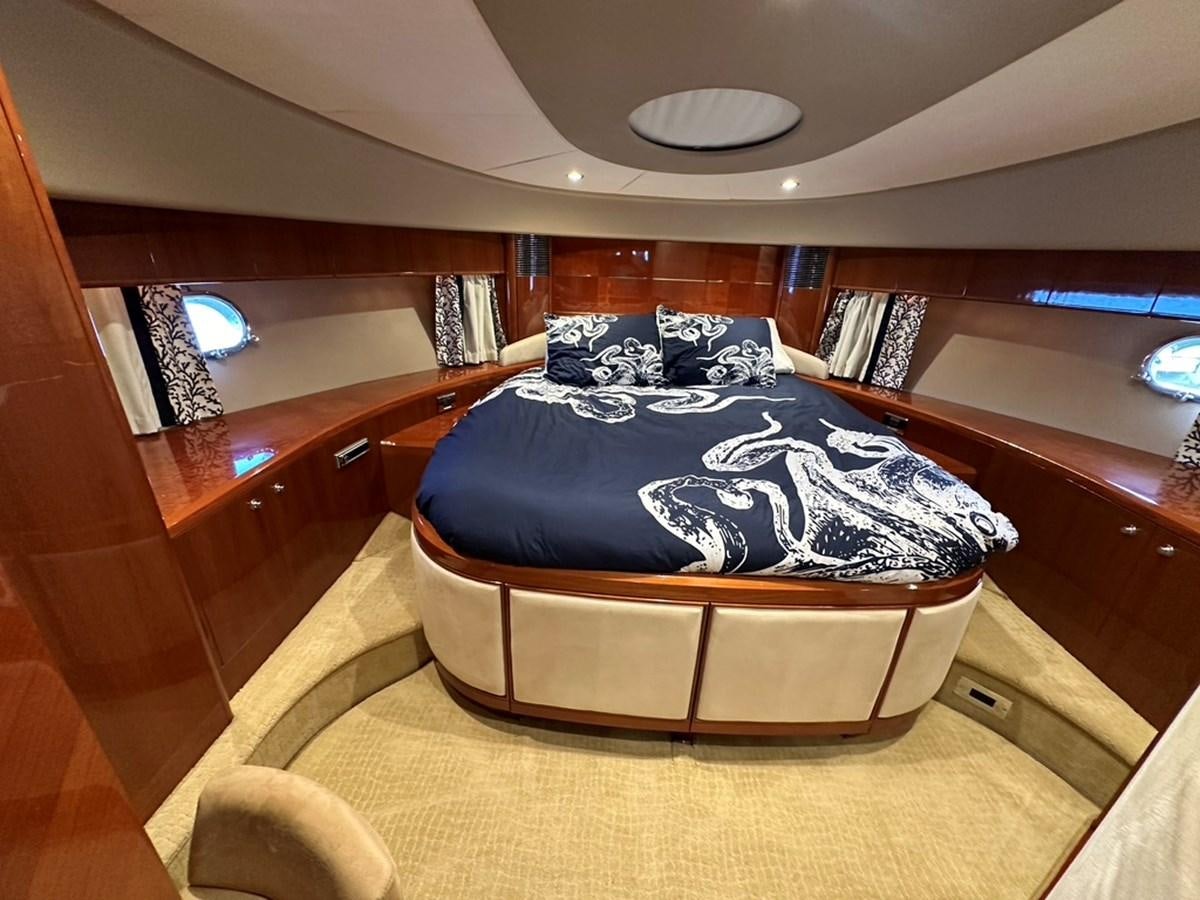 a bed in a room aboard OCARALIA Yacht for Sale