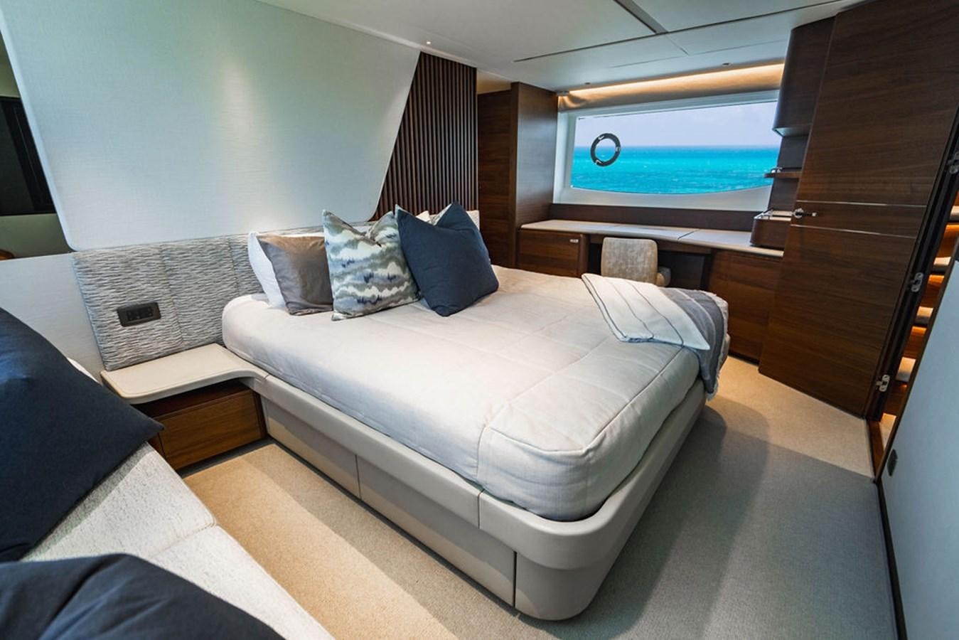 a bed in a room aboard CHAOS Yacht for Sale