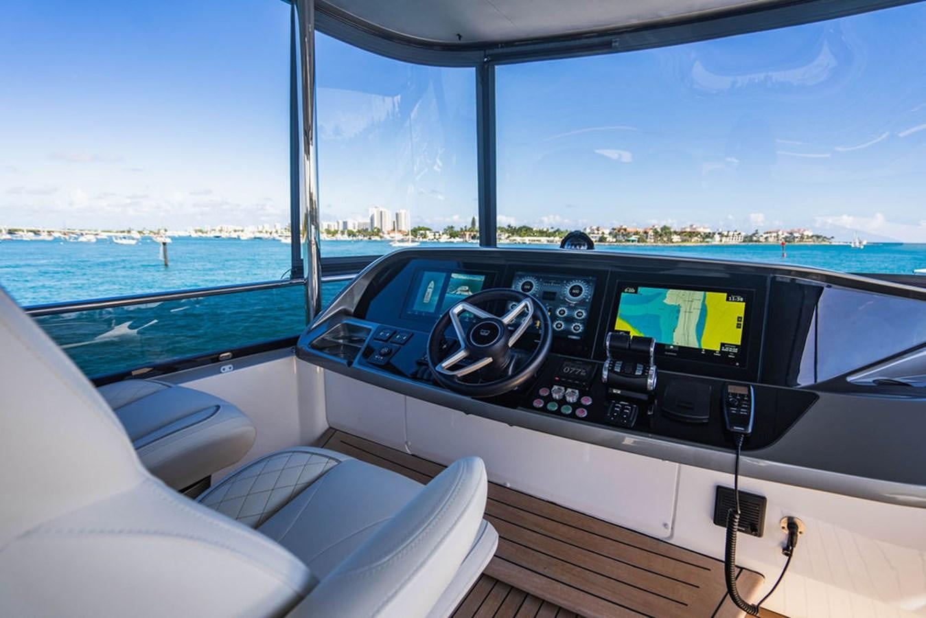 the inside of a car aboard CHAOS Yacht for Sale