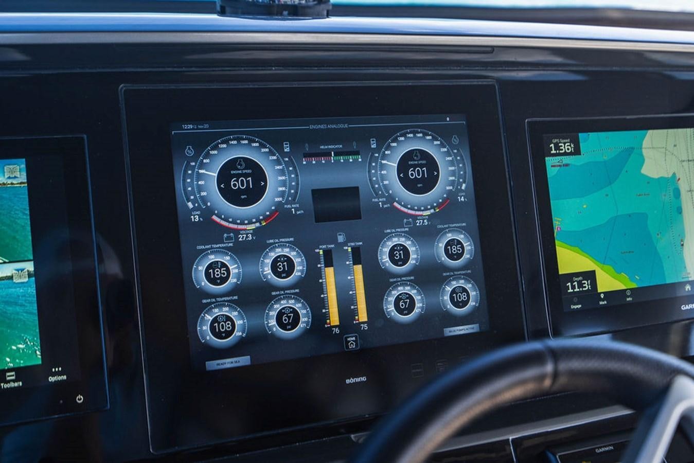 a dashboard of a car aboard CHAOS Yacht for Sale