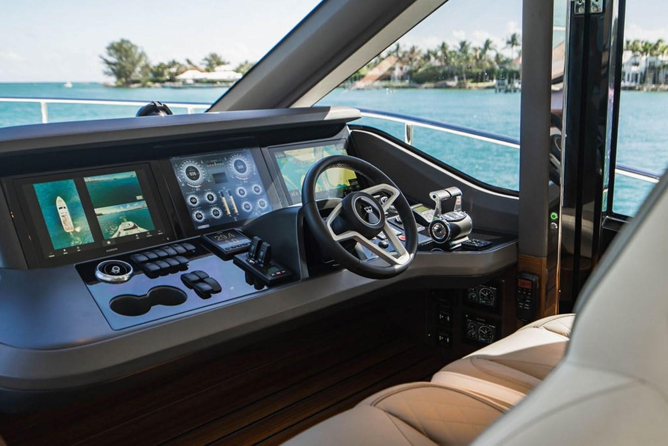 inside of a car aboard CHAOS Yacht for Sale