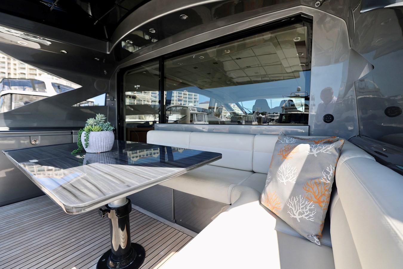 a room with a table and a bed aboard MY WAY Yacht for Sale