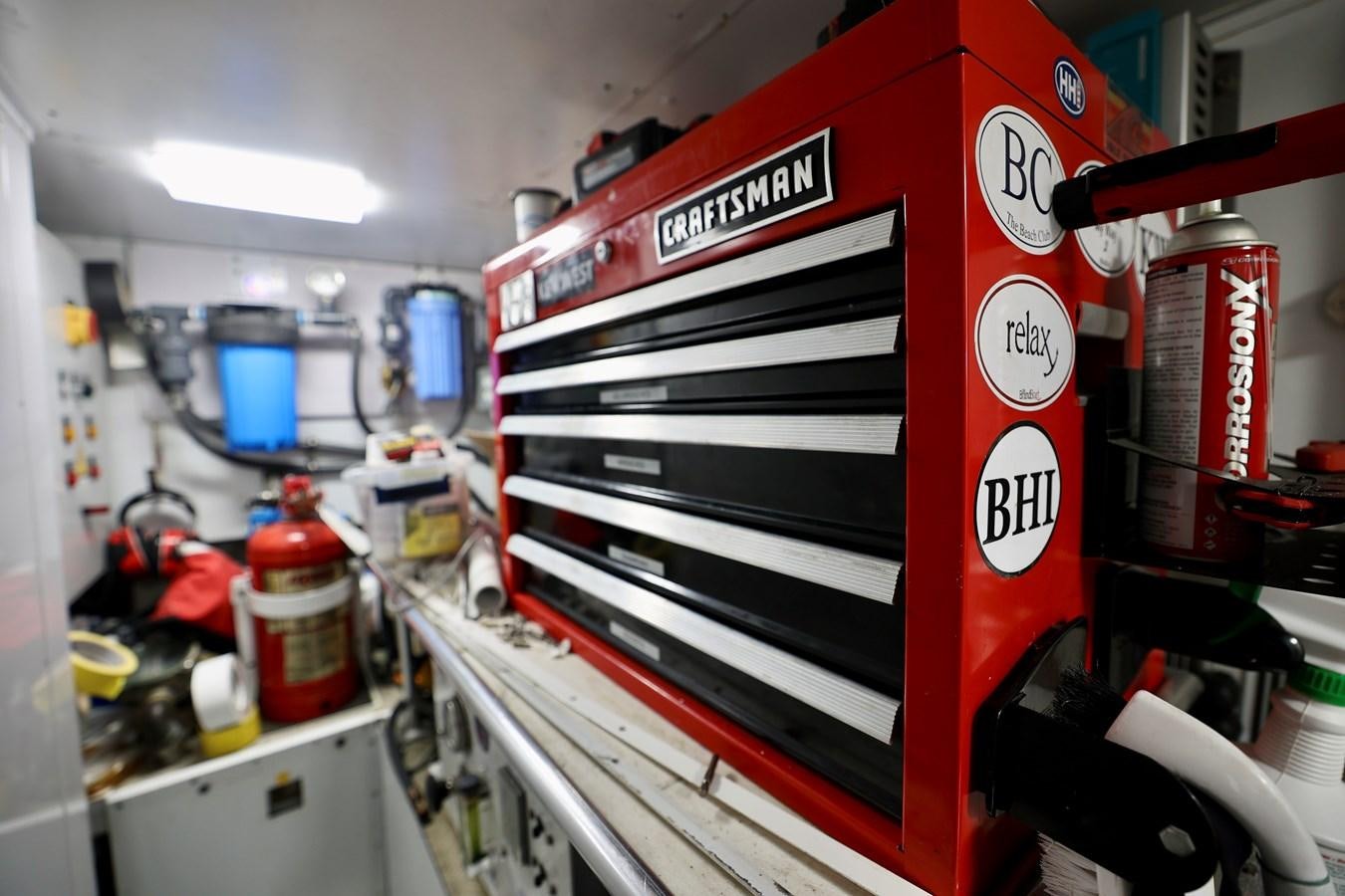 a red machine with a white label aboard MY WAY Yacht for Sale