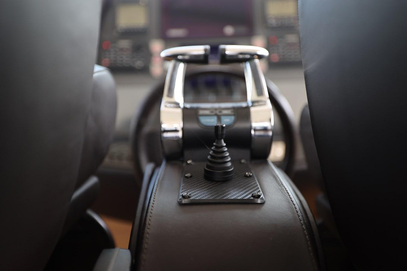 a car with a steering wheel aboard MY WAY Yacht for Sale