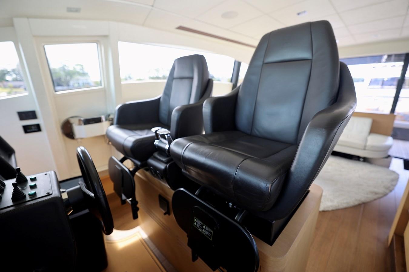 a room with a chair and desk aboard MY WAY Yacht for Sale