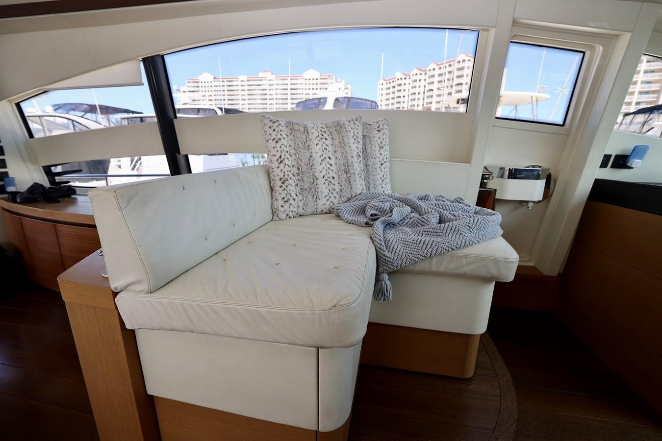 a couch in a room aboard MY WAY Yacht for Sale