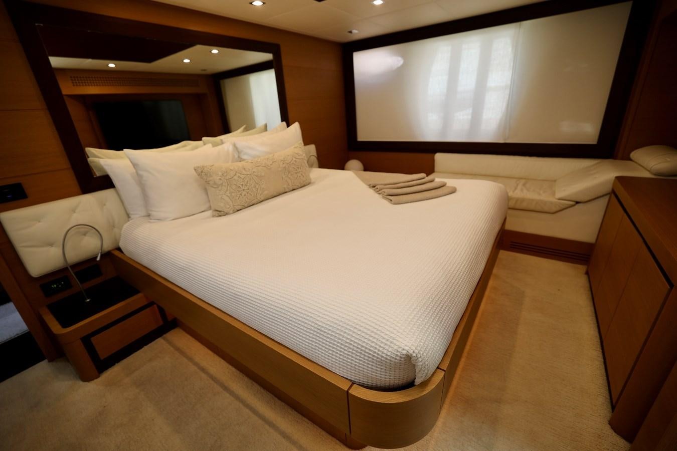 a bed with white sheets aboard MY WAY Yacht for Sale