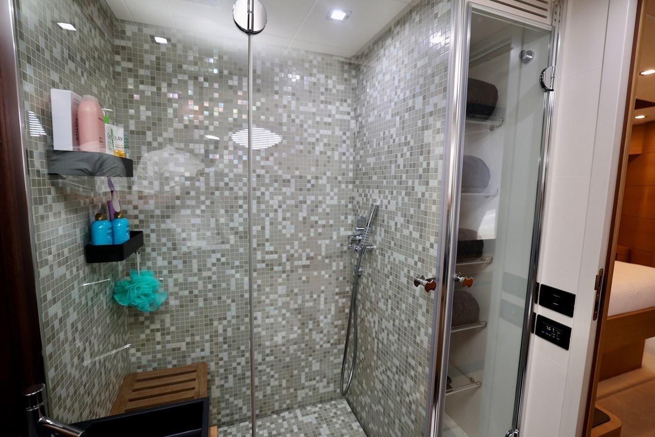 a shower with a glass wall aboard MY WAY Yacht for Sale