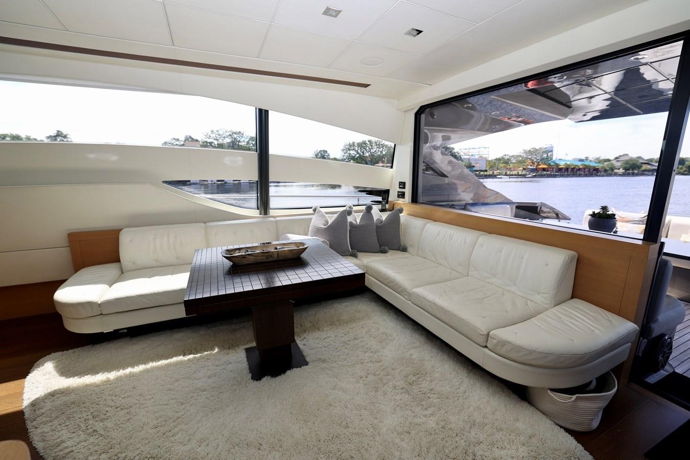 a living room with a couch and a table aboard MY WAY Yacht for Sale