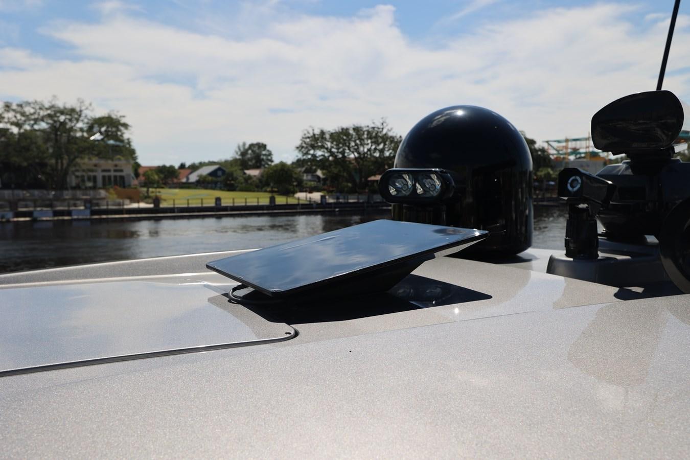 a black helicopter on a surface aboard MY WAY Yacht for Sale