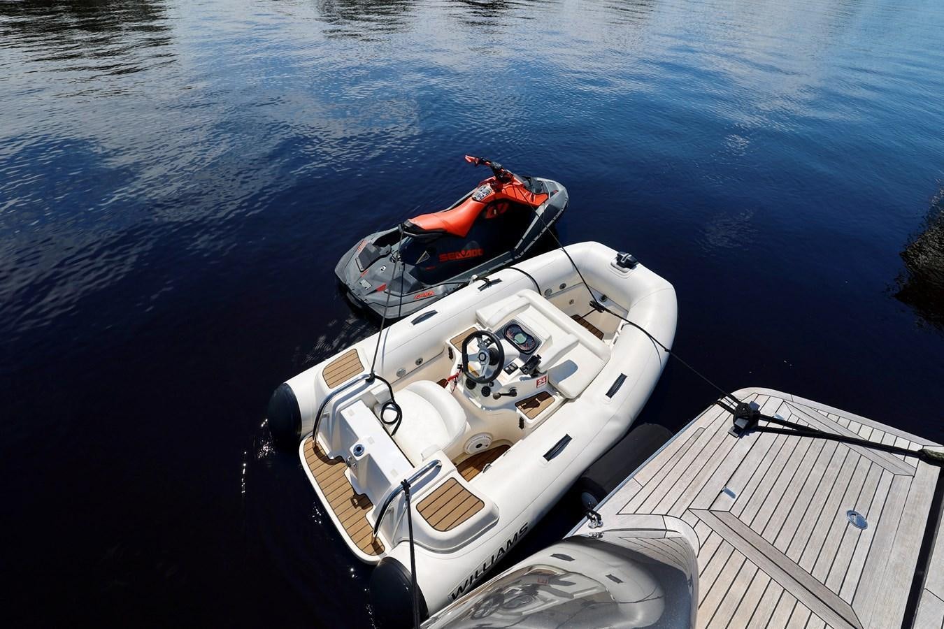 a boat with a motor attached to it aboard MY WAY Yacht for Sale