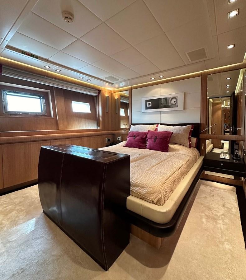 a bed in a room aboard NINO Yacht for Sale