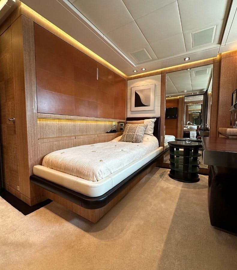 a bed in a room aboard NINO Yacht for Sale