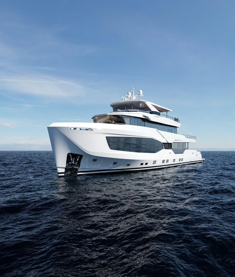 A sleek and modern yacht cruising on the open sea under a clear blue sky. aboard 40MXP Yacht for Sale