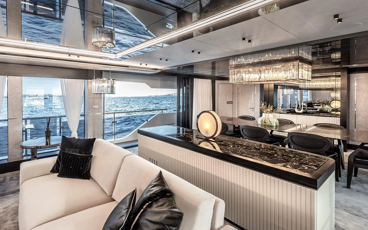 The luxurious salon features elegant furnishings and expansive ocean views. aboard 40MXP Yacht for Sale