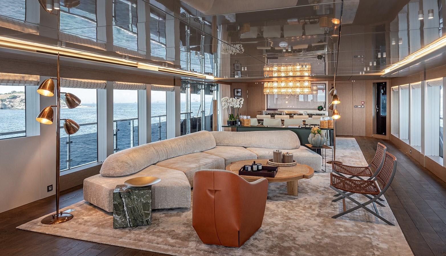 a living room with a large window aboard 37XP Yacht for Sale