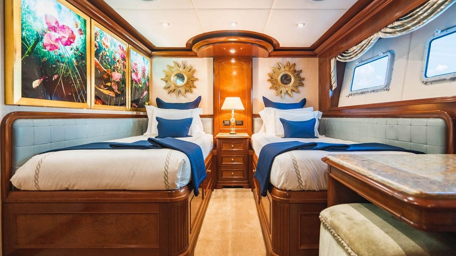 a room with two beds aboard AQUASITION Yacht for Sale