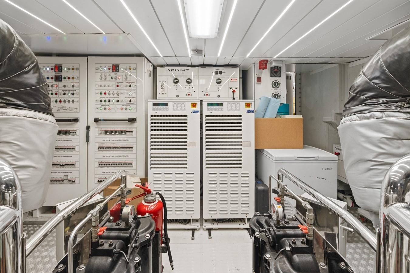 a room full of white machines aboard Y Yacht for Sale