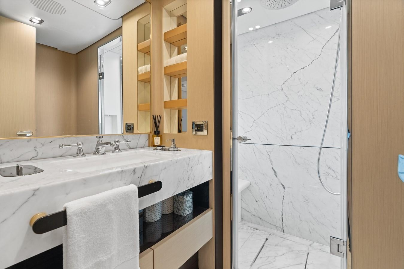 a bathroom with a large white countertop aboard Y Yacht for Sale