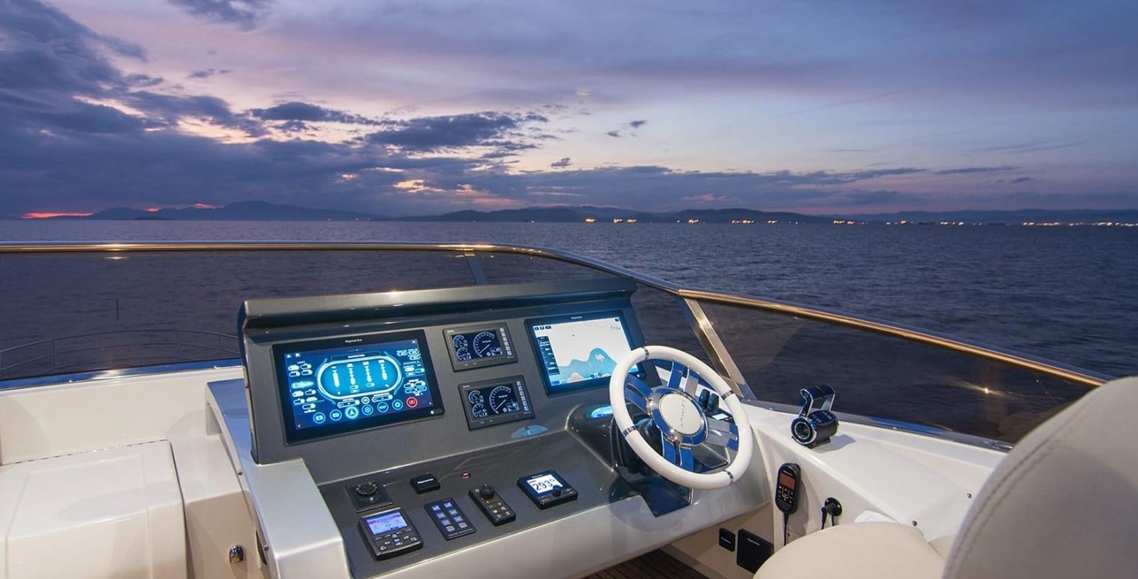 a view of a city from the cockpit of a plane aboard ALEX I Yacht for Sale