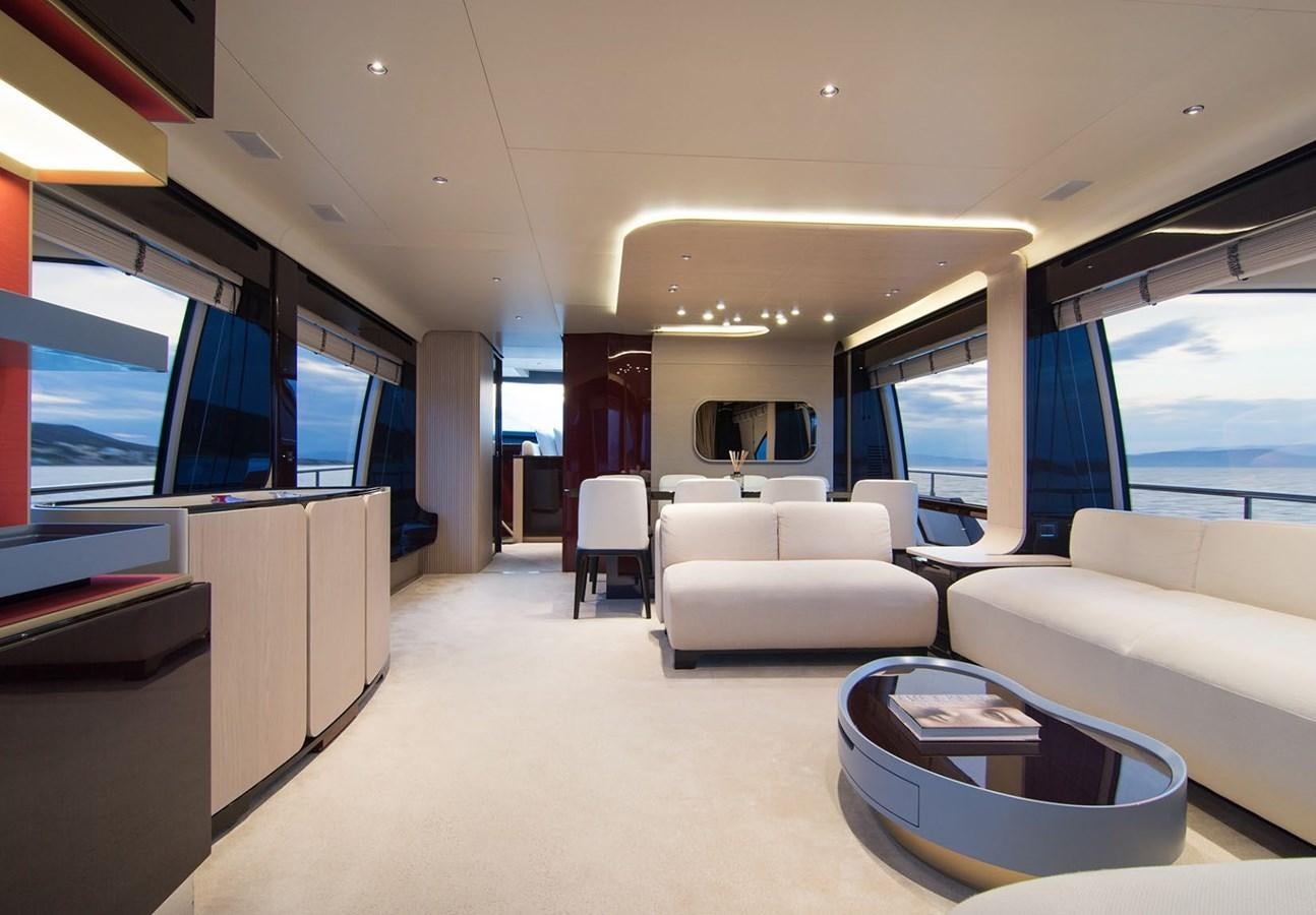 a room with a couch and a table aboard ALEX I Yacht for Sale