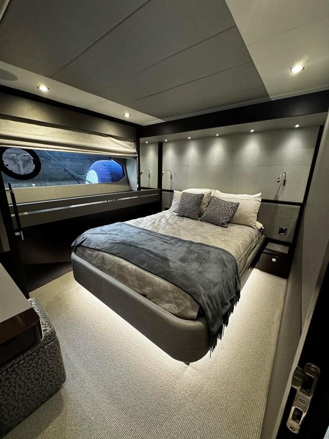 a bed in a room aboard JOURNEY Yacht for Sale