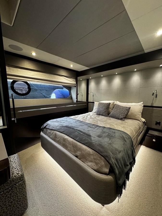 a bed in a room aboard JOURNEY Yacht for Sale
