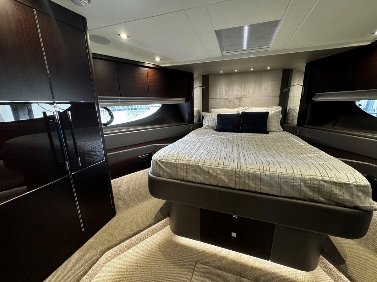 a bed in a room aboard JOURNEY Yacht for Sale