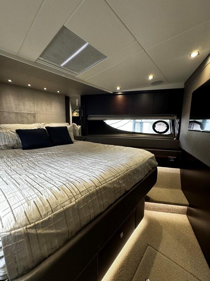 a bed in a room aboard JOURNEY Yacht for Sale