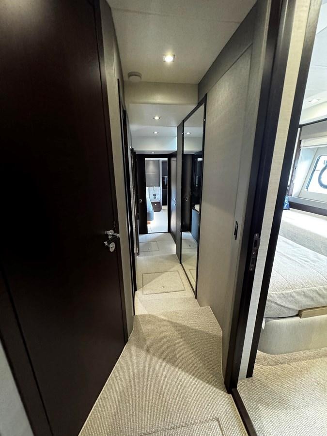 a hallway with doors aboard JOURNEY Yacht for Sale