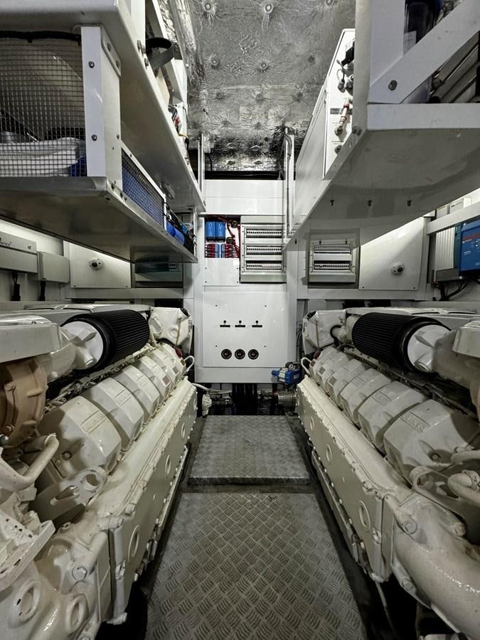 a large room with a large amount of white machines aboard JOURNEY Yacht for Sale