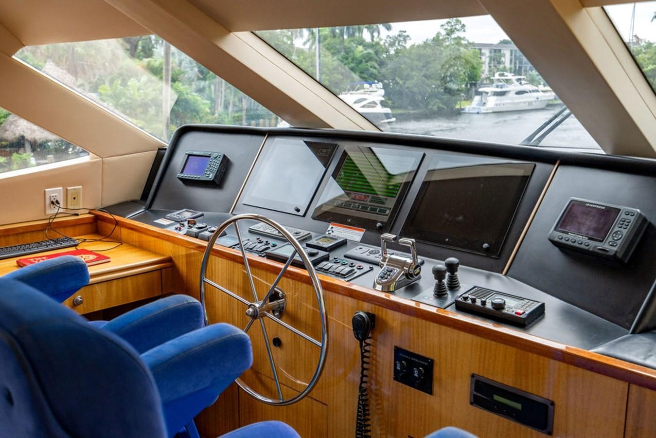 a room with computers and electronics aboard TOP SHELF Yacht for Sale